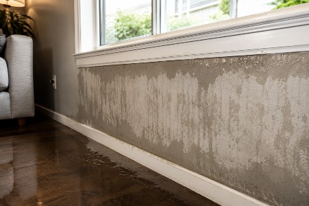 Very wet drywall under window sill - Gold Coast Flood Restorations _ La Jolla CA