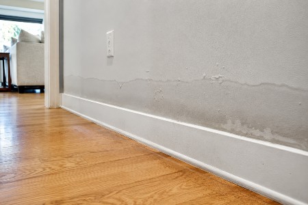 wet hallway in Carmel Valley, CA - Gold Coast Flood Restorations