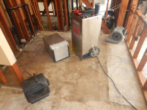 Rancho Bernardo Water Damage restoration equipment drying basement after slab leak